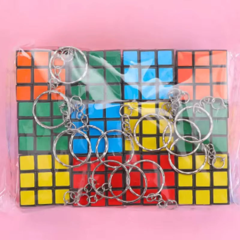 (Pack Of 12) Rubix Cube Keychain Pack | 3x3 Magic Cube Keyring Puzzle Toy | Cartoon Keychains For Kids | Birthday Return Gifts, Party Favor Keychains Set - 20878