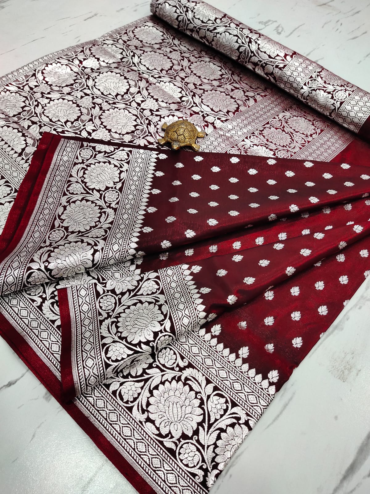 Royal Maroon Handcrafted Pure Satin Banarasi Saree with Heavy Silver Zari & Blouse Border Detailing
