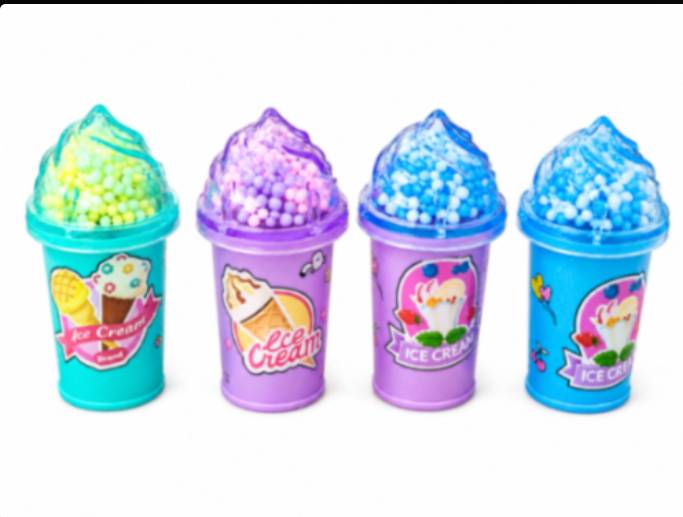 The image displays three ice-cream-shaped pencil sharpeners alongside colorful pencils on a clean - 21174