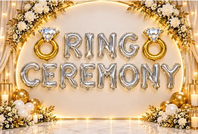 Ring Ceremony backdrop features a stunning arrangement of foil balloons, floral accents, and warm - 21262